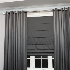 luciano-grommeted-panels-accompanied-with-lorenzo-roman-blinds-1