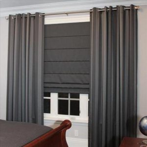 luciano-grommeted-panels-accompanied-with-lorenzo-roman-blinds-2