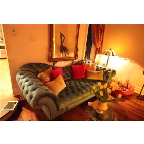 velvet-tufted-sofa